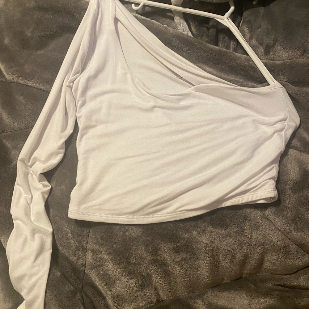 White Long one sleeve top from garage little cut out on the collar bone